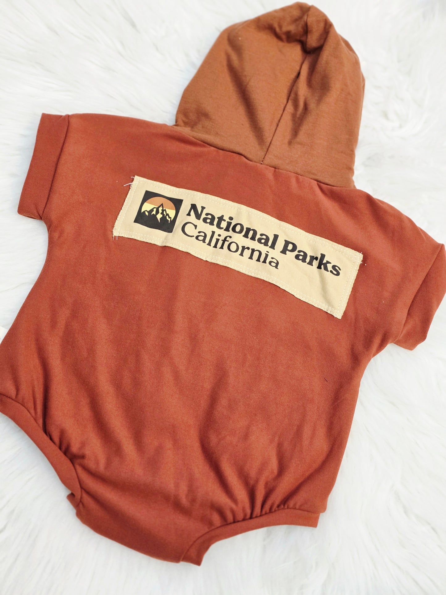 Size 3/6 hooded specialty upcycle sweater romper